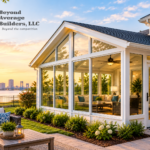 Modern glass sunroom addition showcasing sunroom construction and design by a Jacksonville home builder.